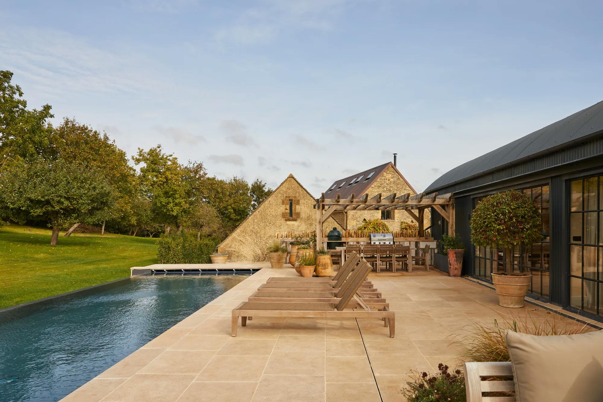 Farmhouse Renovation and Converted Barns With Pool